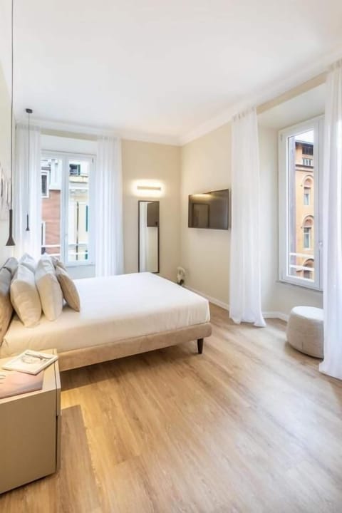 Deluxe Double Room, City View | In-room safe, blackout drapes, soundproofing, iron/ironing board