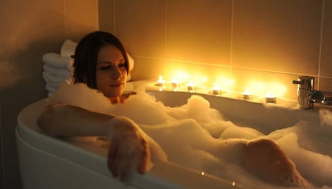 Shower, designer toiletries, hair dryer, bathrobes