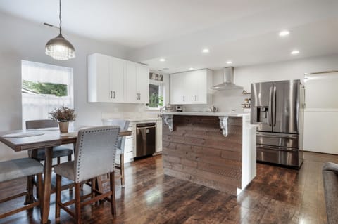 Open kitchen with a marble island