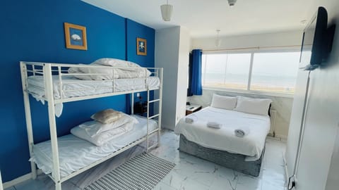 Family Room, Sea View | Iron/ironing board, free WiFi