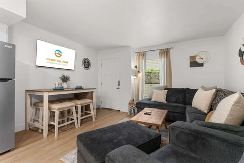 Unwind in the inviting living room & stream your favorites on the smart TV​