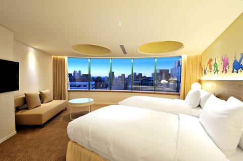 Deluxe Double or Twin Room, City View | Down comforters, in-room safe, desk, iron/ironing board