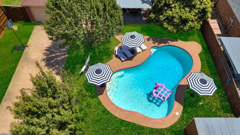 A lovely poolside spot to relax, soak up the sun, and enjoy a peaceful weekend by the water.
