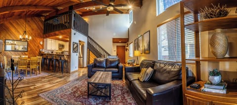Open living area with vaulted ceilings