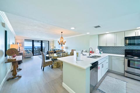 This shows the beginning of the beautiful, modern kitchen that overlooks into the dining area.