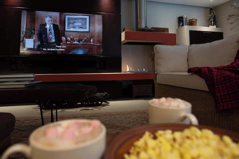 Cosy up this winter with a gas fireplace in the lounge. It really heats up the space very fast. Complete with a streaming TV: you are set for a warm winter in.