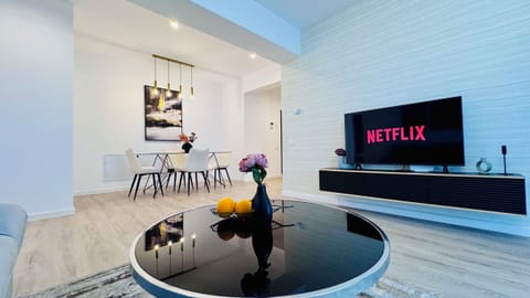 Deluxe Apartment, 2 Bedrooms, Non Smoking | Living area | 126-cm Smart TV with digital channels