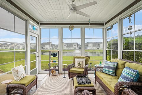 Screen In Porch Sitting Area with View