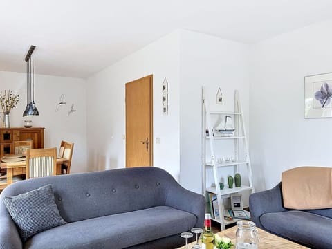 Furniture, Interior Design, Couch, Flooring, Wall, Floor, Living Room, Room, Wood, Ceiling