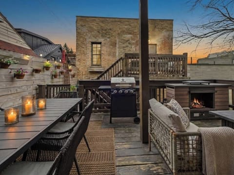 Deck Oasis: Enjoy sunset barbecues and cozy fireside chats in this stylish outdoor retreat!
