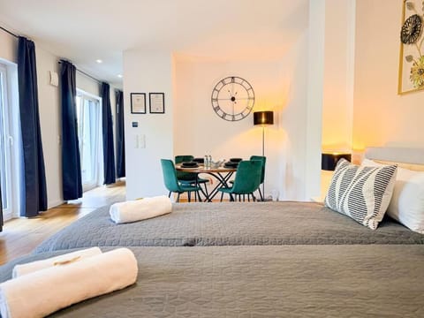 Apartment, 3 Bedrooms, Balcony, Garden View | Soundproofing, iron/ironing board, free WiFi