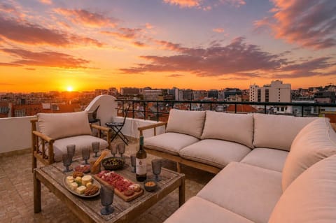 1 · Rooftop terrace with panoramic Lisbon city views · StayInLisbon