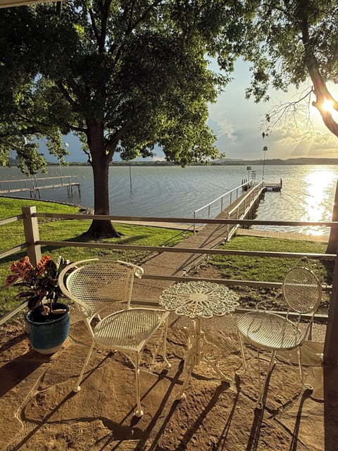 Watch the kids jump into the lake and fish just steps from the covered deck. 
