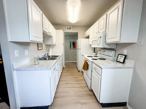 Clean and modern kitchen fully stocked for your stay