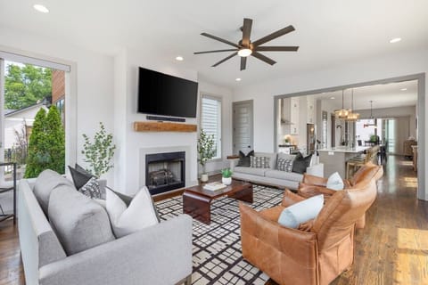 Spacious living room with lots of natural light and comfortable seating for your group. Smart TV with all the streaming apps and an easy-to-use gas fireplace for cozy nights in.
