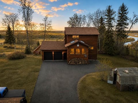 Front drive. You may enter through the garage door OR go to the right of the house and enter off the porch. 