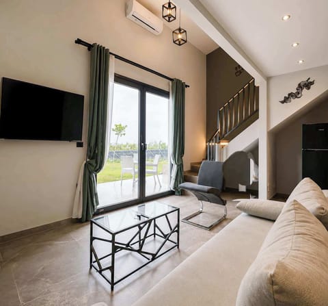 Bright and modern living area with direct access to the patio area and plenty of natural light throughout the day.