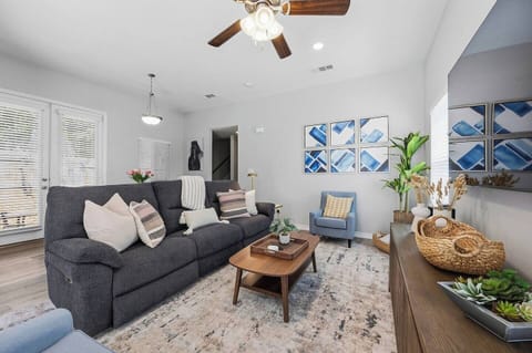 Relax in a stylish open-concept living area perfect for debriefing after a Rangers game, catching highlights on the smart TV, or simply unwinding with your group after a day in Arlington.