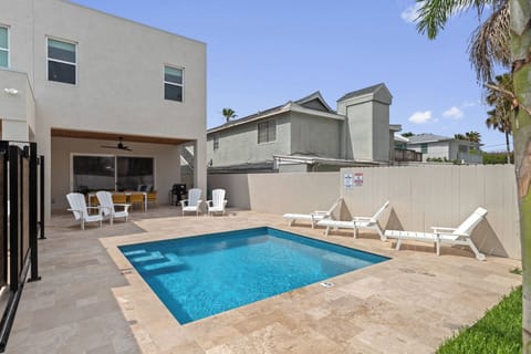Backyard oasis with a sparkling private pool and plenty of lounging space