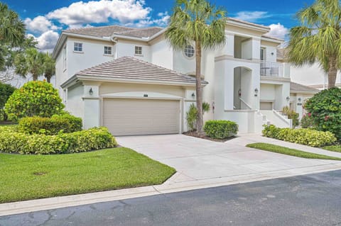 WestBay1 - First floor coach home in the exclusive West Bay Club community. Two car attached garage