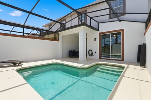 Private screened splash pool with no rear neighbors — your own peaceful oasis after busy park days.