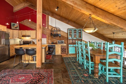 Rustic chic kitchen with farmhouse dining table for 8
