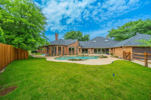 Private Resort-Style Pool Oasis with Massive Fenced-In Green Lawn
