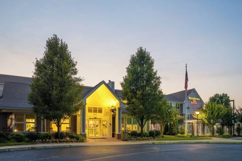 Arrive to a warmly lit entrance that feels instantly welcoming.