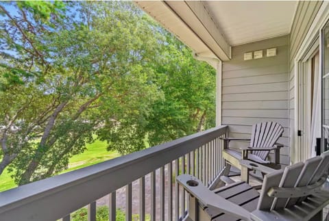 Enjoy your morning coffee with a view from this serene private balcony.