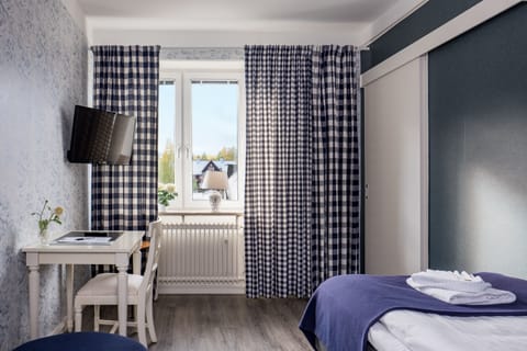 Single Room | Desk, blackout drapes, iron/ironing board (on request)