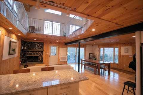 Stunning view from the kitchen island highlighting the incredible double-height 