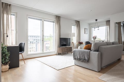 Enjoy a bright and spacious living area perfect for unwinding after a long day of exploring. The comfortable seating and smart TV setup ensure you won’t miss your favorite shows during your stay.