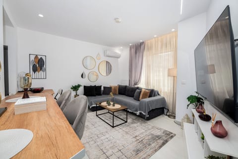 Chic living space with modern decor and cosy seating