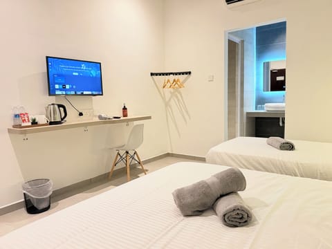 Family Triple Room, Non Smoking | Desk, laptop workspace, iron/ironing board, free WiFi