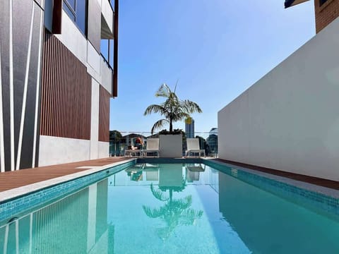A serene pool, perfect for a refreshing dip under the sun.