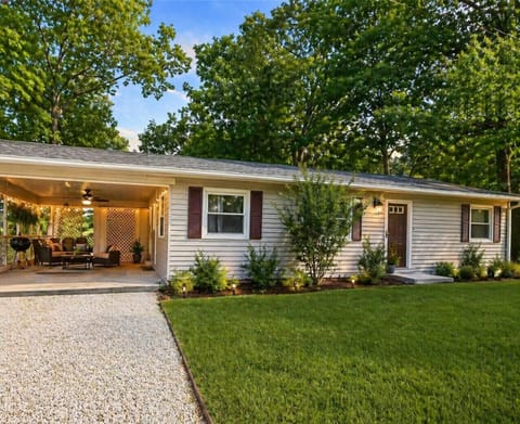 Charming cozy retreat with a covered patio, spacious yard, and modern comforts—ideal for family vacations, weekend getaways, and relaxing stays near top local attractions.
