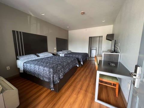 Double Room, 2 Queen Beds, Smoking | Desk, laptop workspace, WiFi (free)