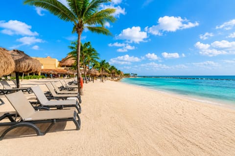 Beach nearby, white sand, sun loungers, beach umbrellas