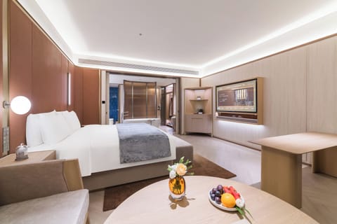 Premium bedding, down comforters, free minibar, blackout drapes