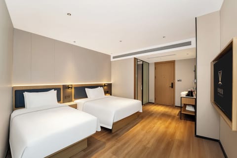 Family Triple Room, Courtyard View | Desk, blackout drapes, soundproofing, free WiFi