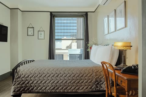 Private Room w/Full Bed & Private Ensuite Bathroom | Blackout drapes, iron/ironing board, free WiFi, bed sheets