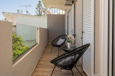 Cozy private balcony with outdoor seating area