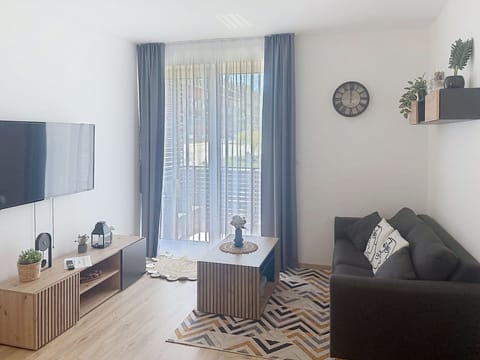 Furniture, Interior Design, Wall, Flooring, Wood, Floor, Room, Home, Lighting, Living Room