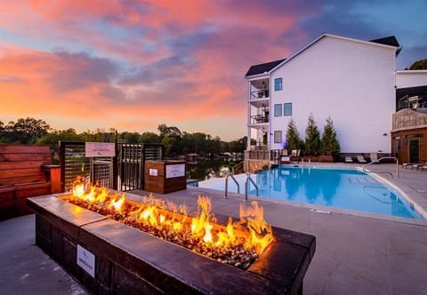 Community infinity-edge pool overlooking the lake