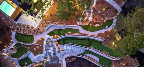 Winding greens and serene forest views — mini golf has never looked this dreamy.