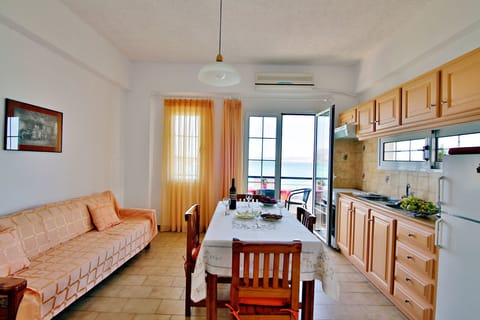 Apartment, 2 Bedrooms | Private kitchen | Fridge, stovetop, coffee/tea maker, electric kettle