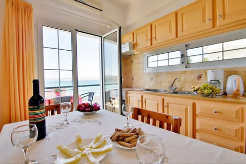 Apartment, 2 Bedrooms | Private kitchen | Fridge, stovetop, coffee/tea maker, electric kettle