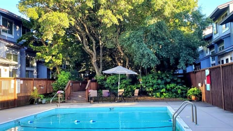 Community pool just steps from the condo in Pine Knoll Shores—visible from the front door for easy access, yet set far enough away to maintain privacy. Perfect for relaxing between beach days on Bogue Banks, near Emerald Isle and Atlantic Beach.