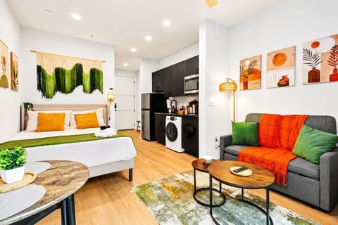 Relax in a bright and welcoming living space with comfortable seating, fast WiFi and a Smart TV after a day exploring the city.