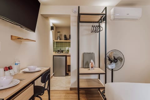 Basic Apartment | Minibar, desk, laptop workspace, iron/ironing board